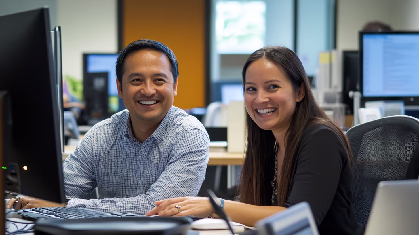 IT technician consulting with a small business owner in an office, showcasing expert managed IT services and personalized support in Canton.